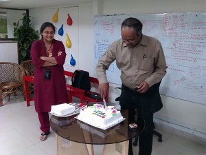 Mr Vinod cutting the 11th anniversary cake